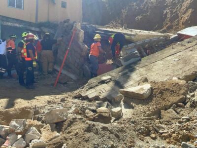 Colapso de estructura en Arroyo Abajo, Santiago, deja posible persona atrapada y activa amplio operativo de rescate